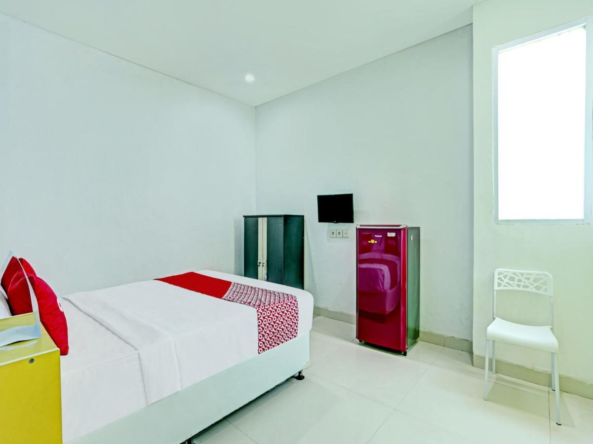 Oyo 3856 Tizta Suites Bali Санур Экстерьер фото